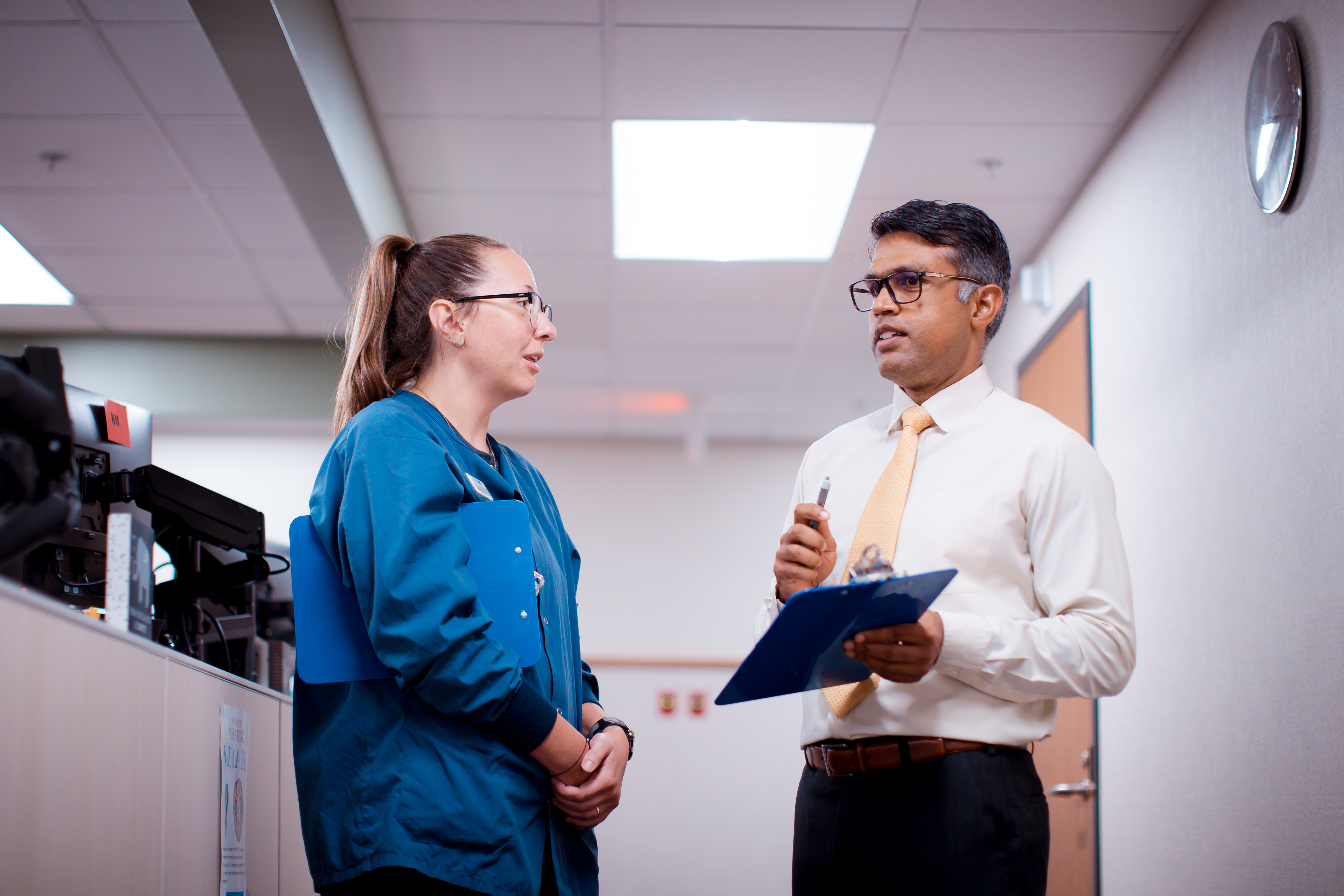 Nurse talking with doctor