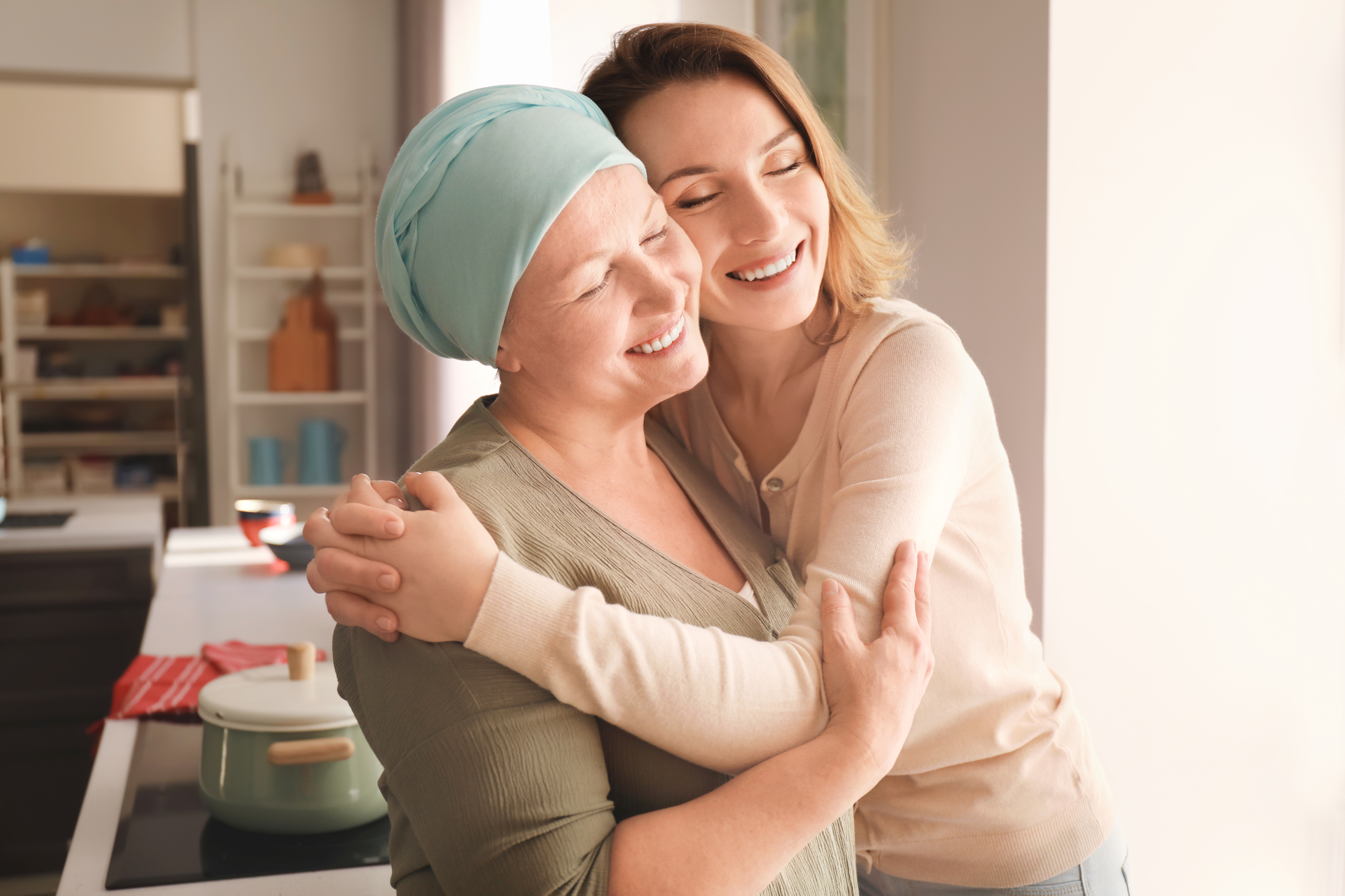 Patient embraced by a loved one.