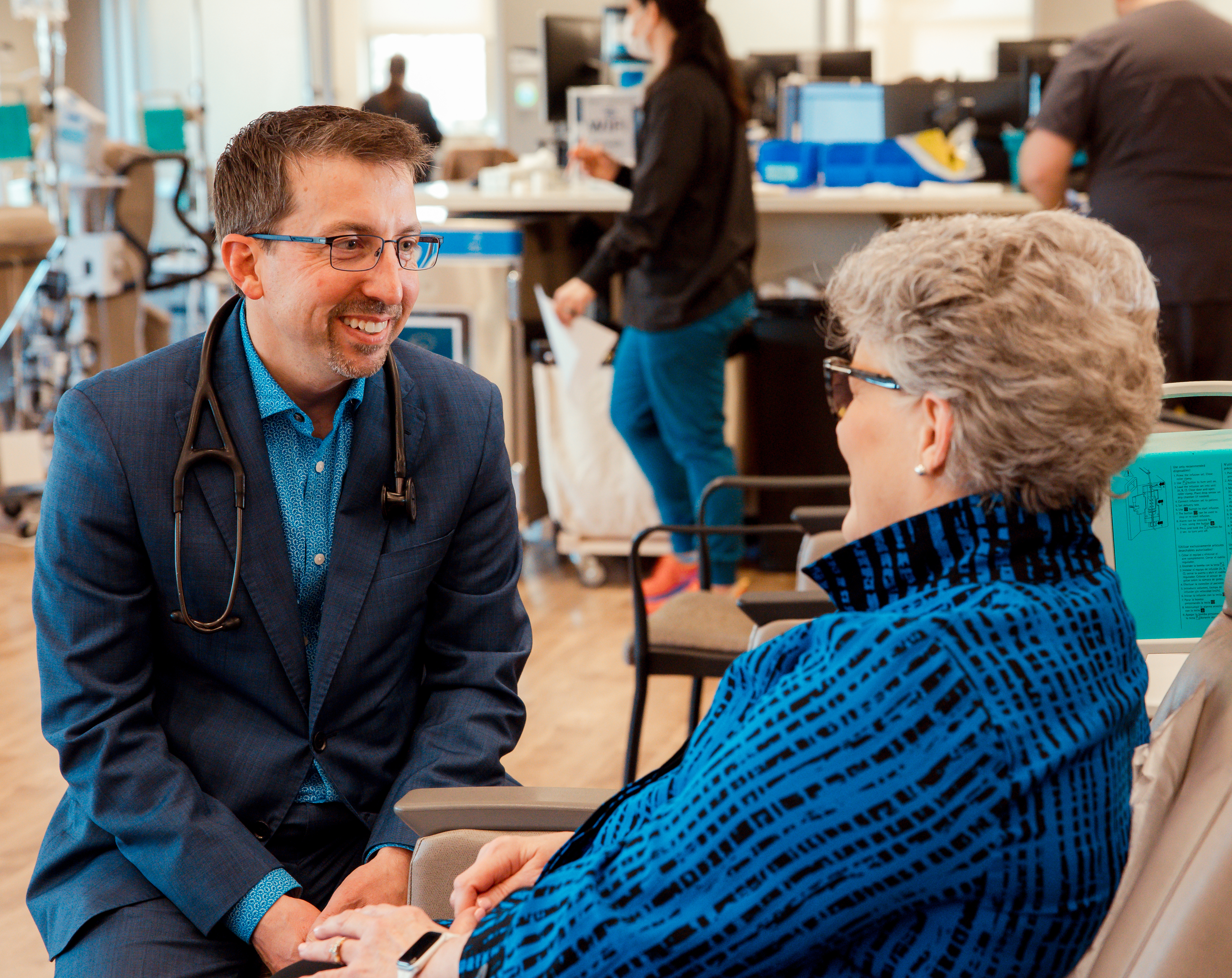 Doctor speaking with patient