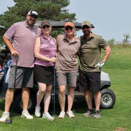 Group of four golfers