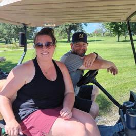 Couple Golfing