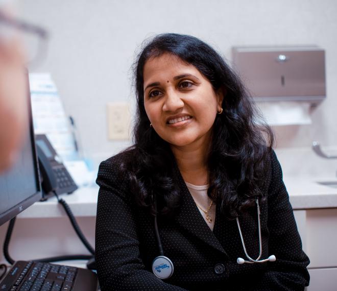 Doctor listening to patient