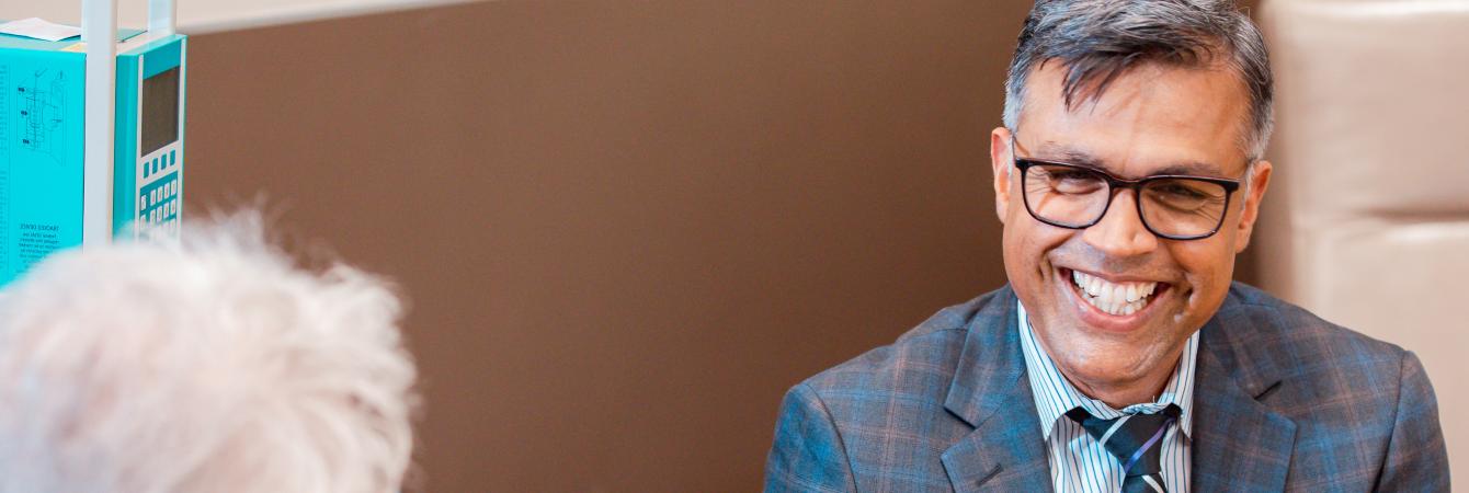 Doctor smiling with patient