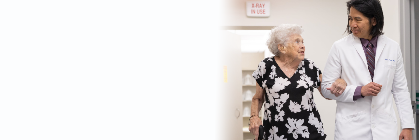 Doctor walking with patient