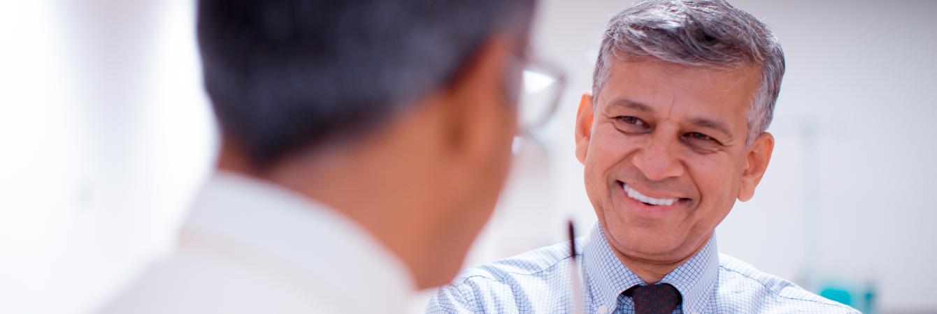 Two doctors speaking to one another