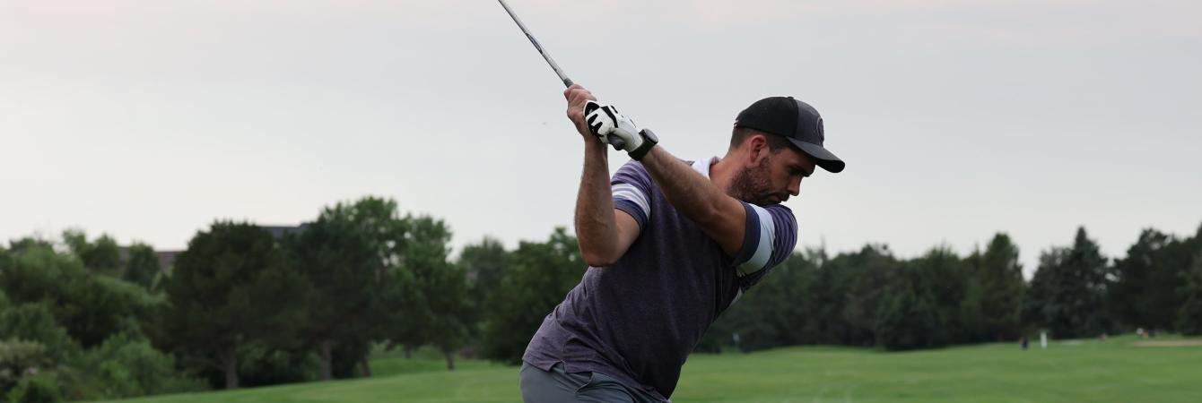 Golfer Swinging
