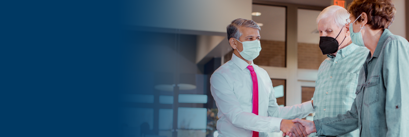 Doctor shaking hands with patient