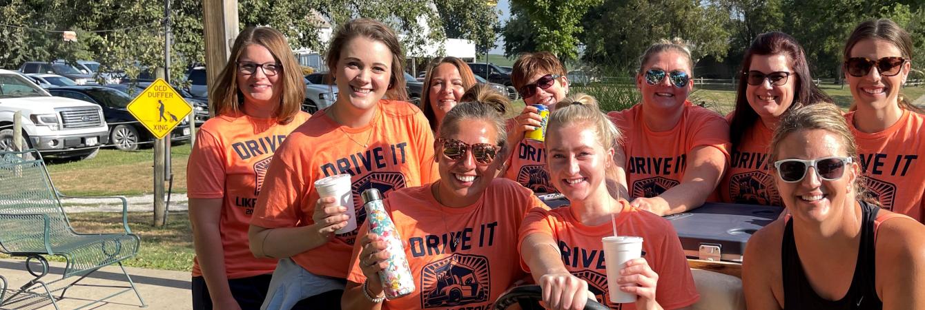 Volunteers on Golf Cart